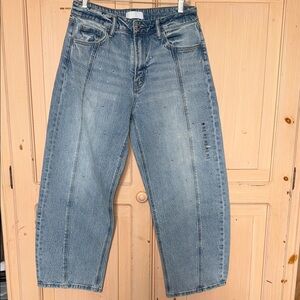 Light Blue Boyfriend Jeans with Vertical Seams and Stud Accents